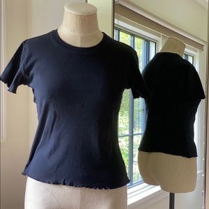 Basic black tee with ruffled bottom edges